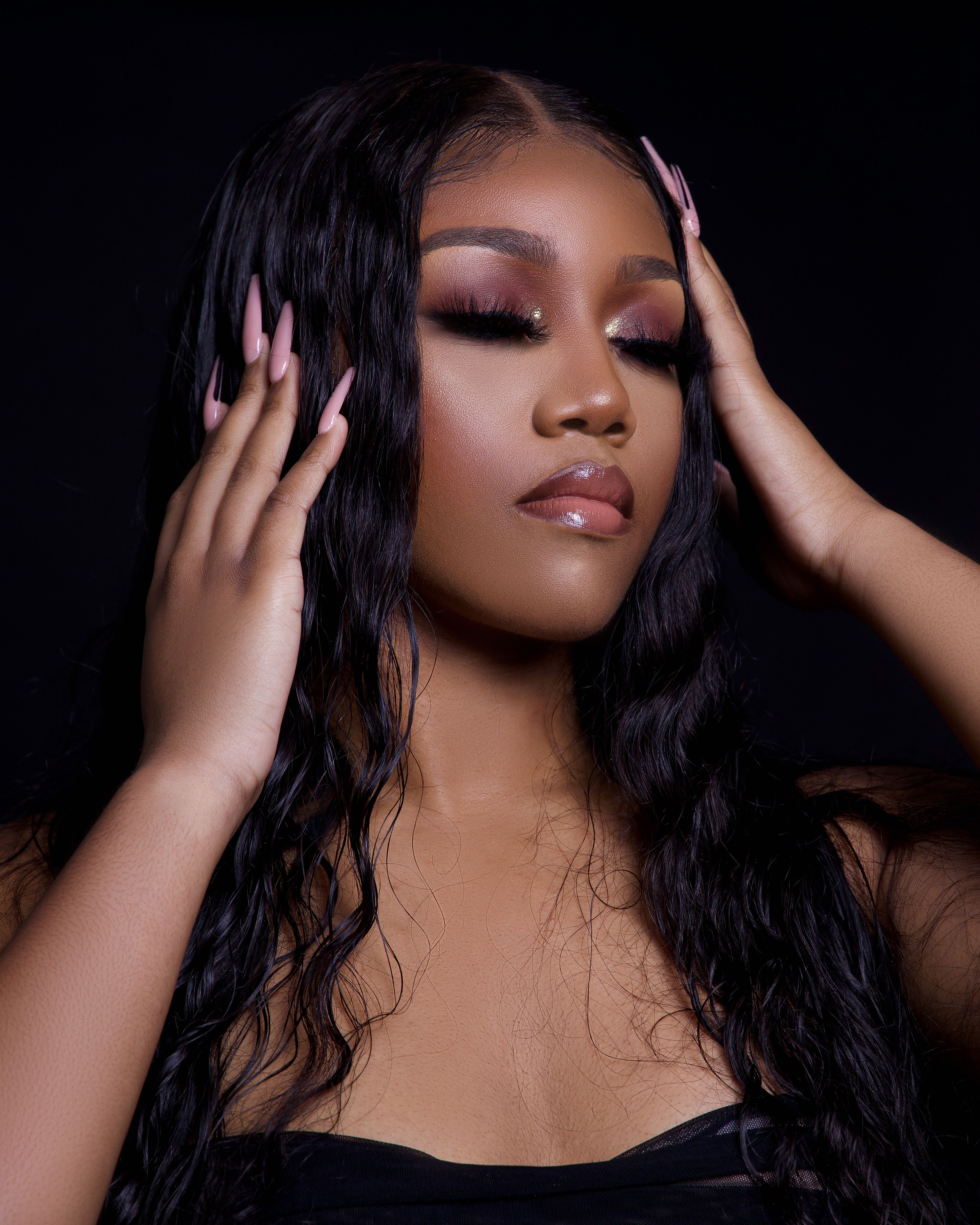 Nigerian woman wearing long luxury human hair